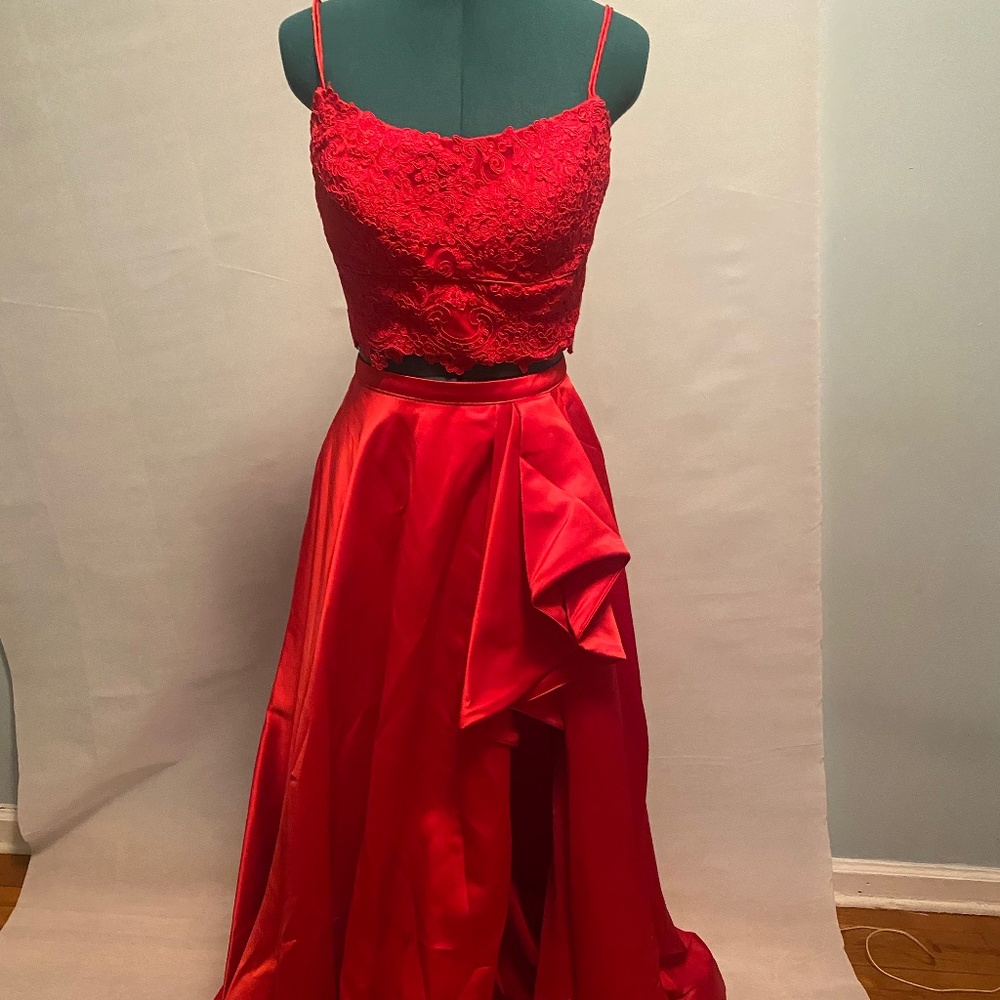 Brand New 2 pice set Red skirt and top .